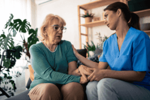 elderly home caregiver compassionate care supporting patients in grief